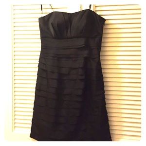 Black cocktail dress size 8. Has optional belt.